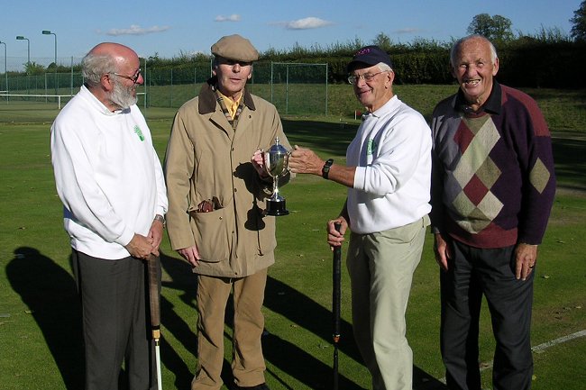 1.Img0588_edited-1.JPG - Jim Ward presenting the Kenilworth Cup to Peter D with runner up Pat W & Doug T looking on  